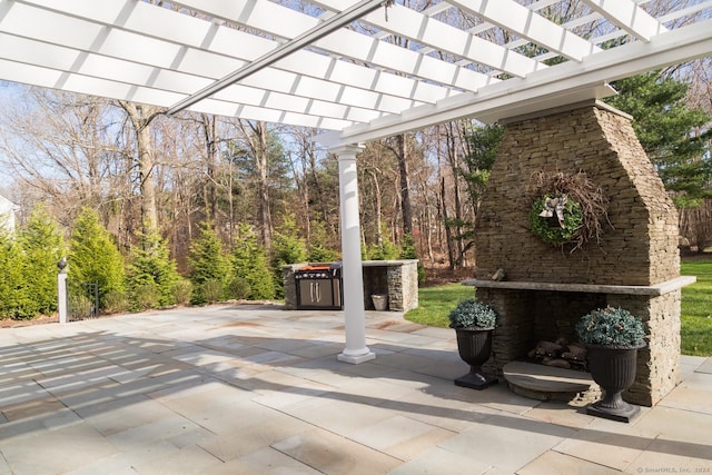 view of patio / terrace featuring a pergola