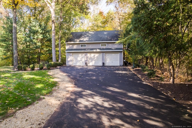 exterior space with a garage