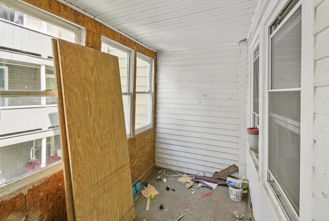 unfurnished sunroom with a wealth of natural light