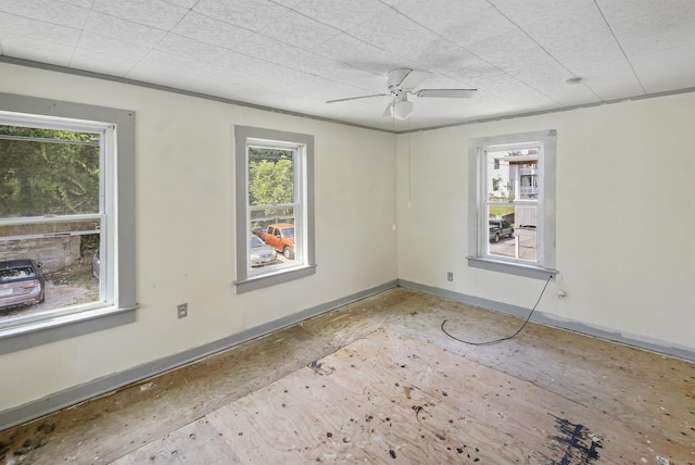 unfurnished room featuring ceiling fan