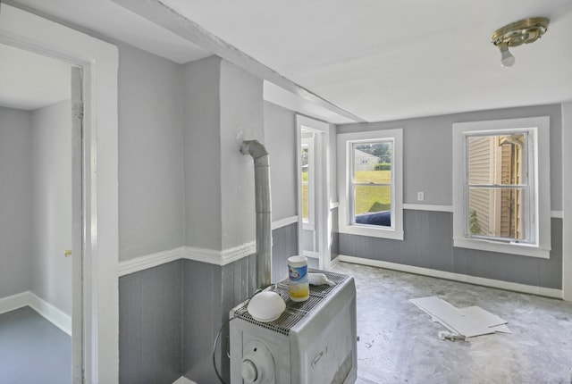 bathroom with concrete flooring