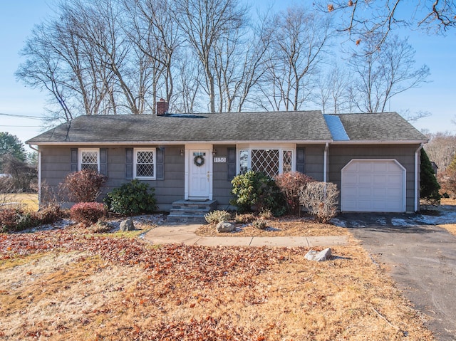 single story home with a garage