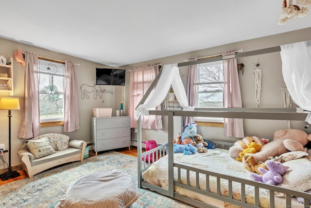 bedroom featuring hardwood / wood-style flooring