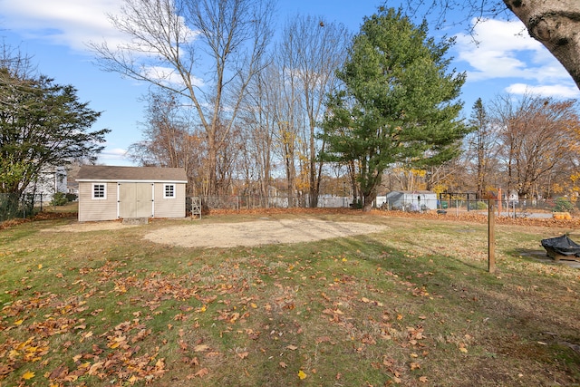 view of yard with a storage shed