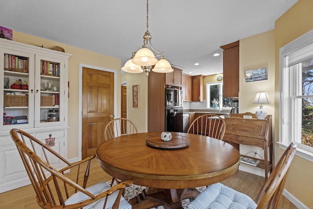 dining room featuring light wood-type flooring