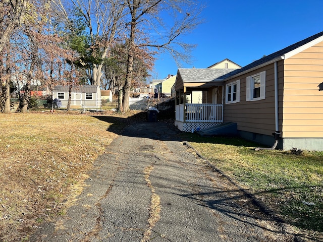 view of home's exterior featuring a yard