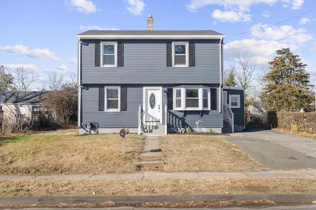 view of front property with a front yard