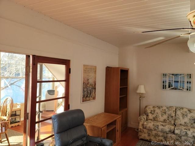 office space with ceiling fan and hardwood / wood-style floors