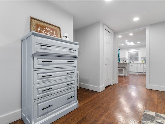 interior space with dark hardwood / wood-style floors