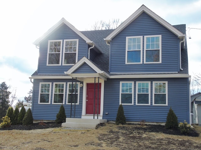 view of front of home featuring a shingled roof