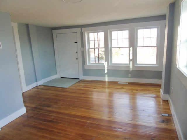 foyer featuring dark hardwood / wood-style floors