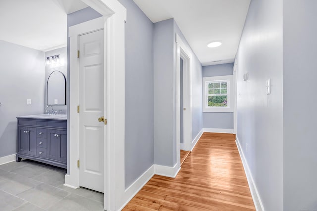 29 Great Hill Rd, Seymour, CT 06483 - hallway with baseboards and a sink