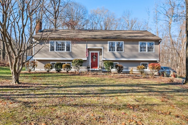 split foyer home with a front yard