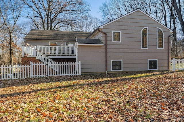 exterior space featuring a wooden deck