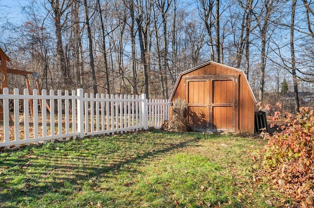 view of outbuilding featuring a yard