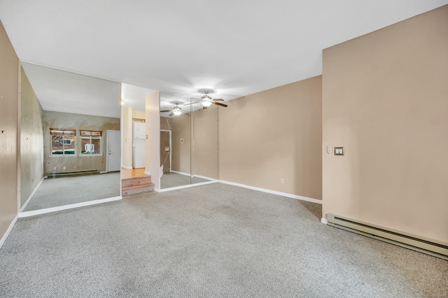 unfurnished living room with ceiling fan, carpet floors, and a baseboard radiator