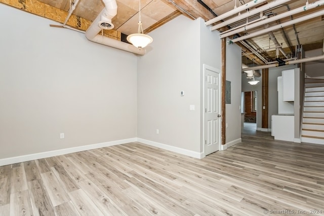 basement with wood-type flooring