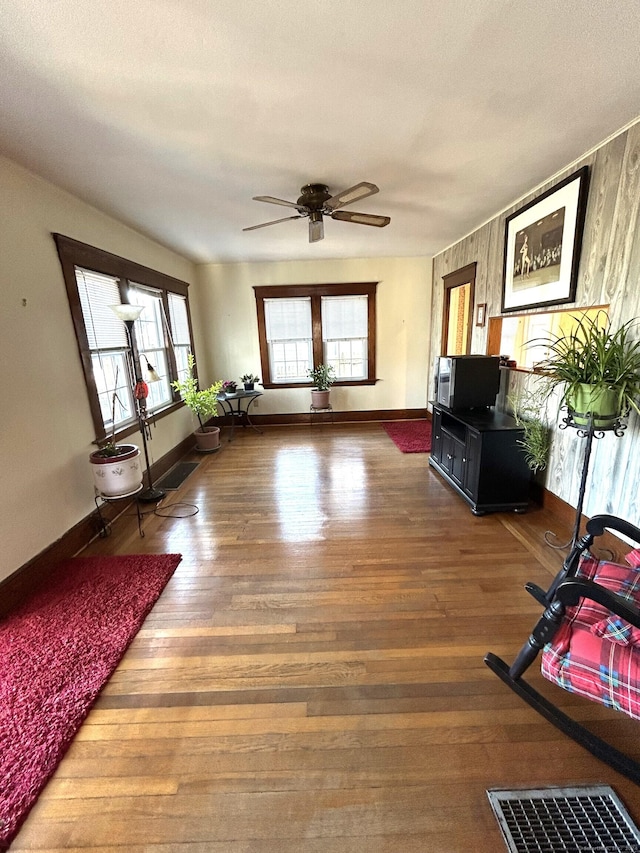 interior space with dark hardwood / wood-style floors, ceiling fan, a textured ceiling, and french doors