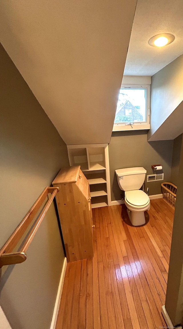 bathroom featuring hardwood / wood-style flooring