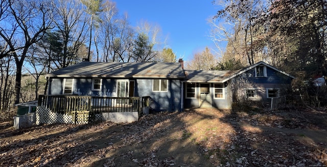 ranch-style house with a wooden deck