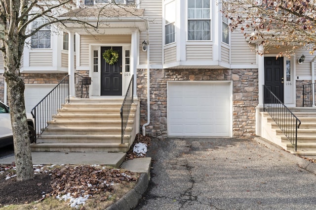 property entrance with a garage