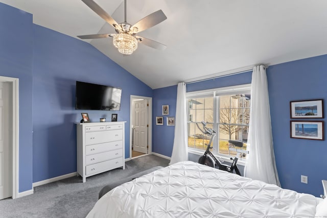 bedroom featuring dark colored carpet, ceiling fan, and lofted ceiling