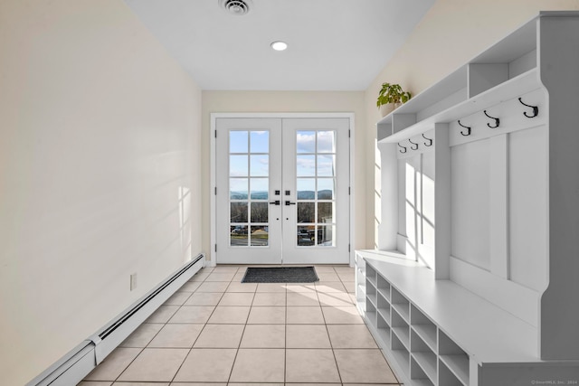 mudroom featuring french doors, baseboard heating, and light tile patterned flooring