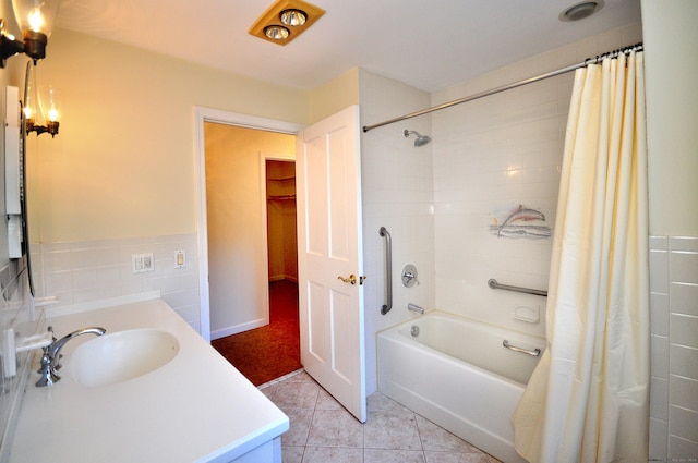 bathroom with shower / bath combo, vanity, and tile patterned flooring