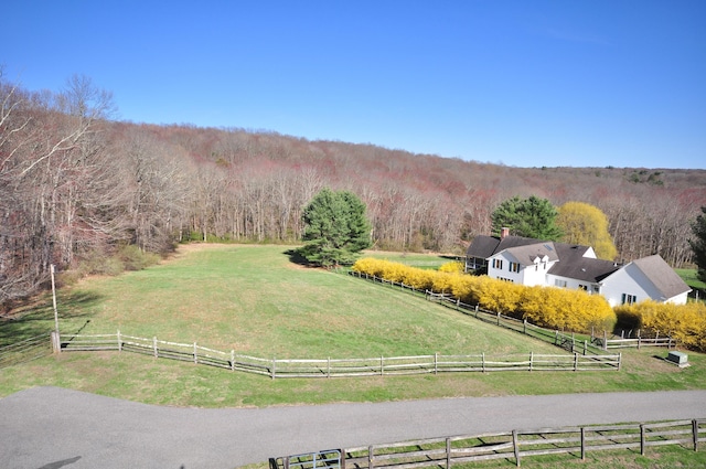 bird's eye view with a rural view and a forest view