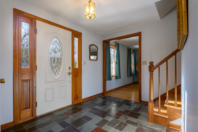 entrance foyer featuring dark hardwood / wood-style floors