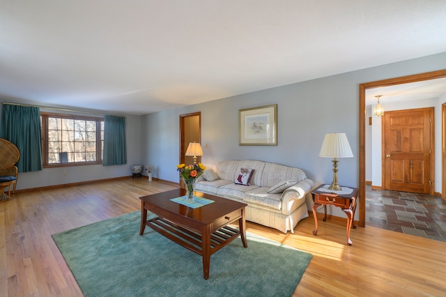 living room with light hardwood / wood-style flooring