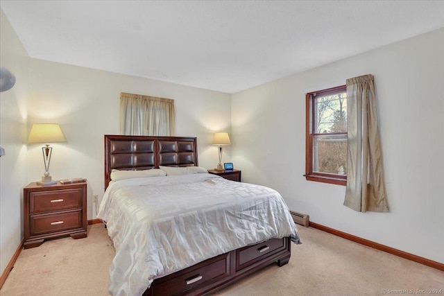 carpeted bedroom with baseboard heating