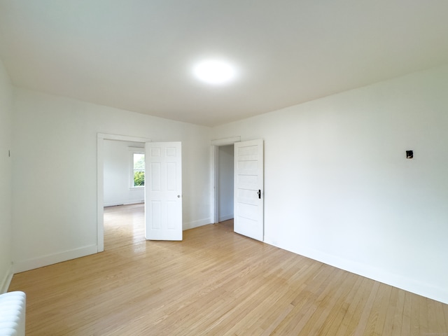 empty room featuring light hardwood / wood-style floors