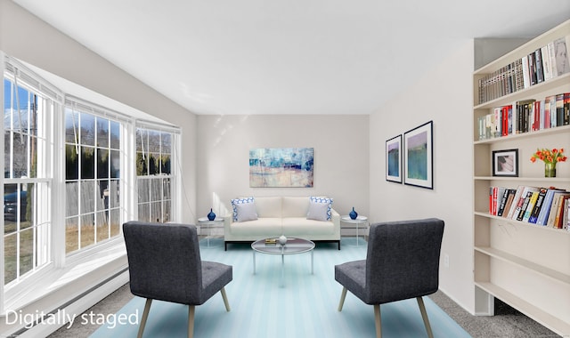 living room featuring hardwood / wood-style floors and baseboard heating