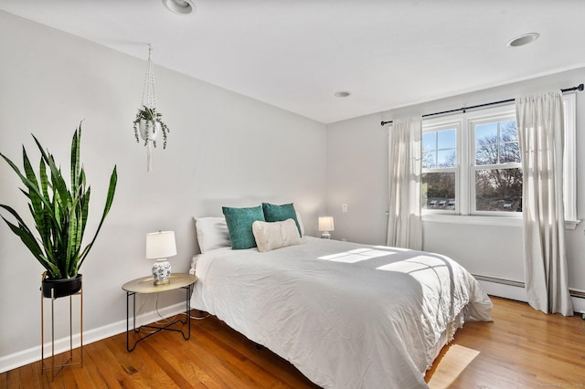 bedroom featuring light hardwood / wood-style floors