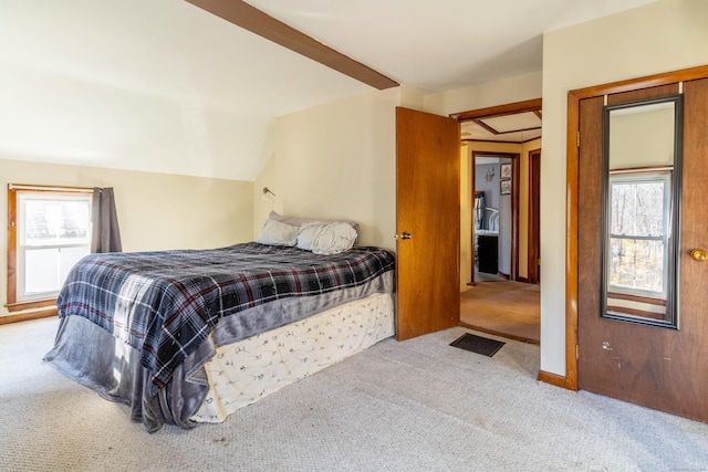 bedroom featuring light colored carpet