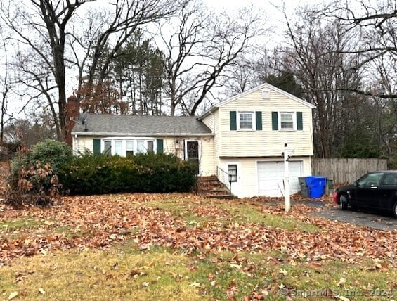 split level home with a garage