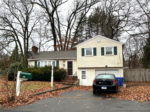 split level home featuring a garage