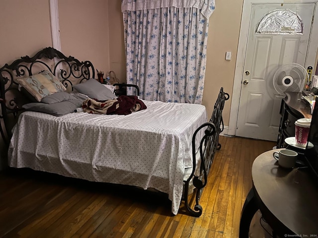 bedroom featuring hardwood / wood-style flooring