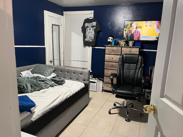 bedroom featuring tile patterned floors