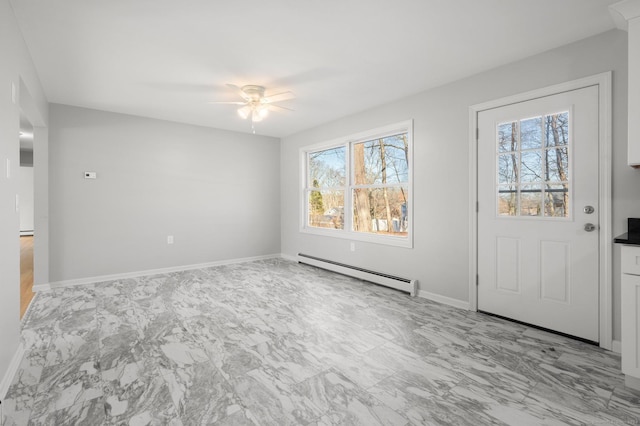 foyer featuring a baseboard radiator, plenty of natural light, and ceiling fan