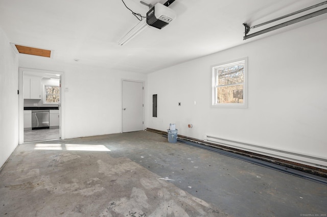 garage with electric panel, baseboard heating, and a garage door opener