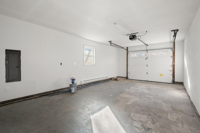 garage featuring electric panel and a garage door opener