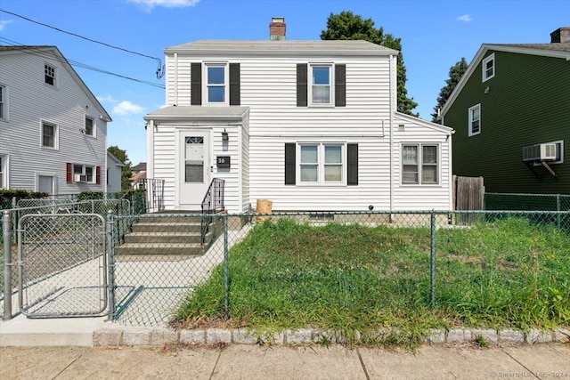 view of front property featuring a front lawn