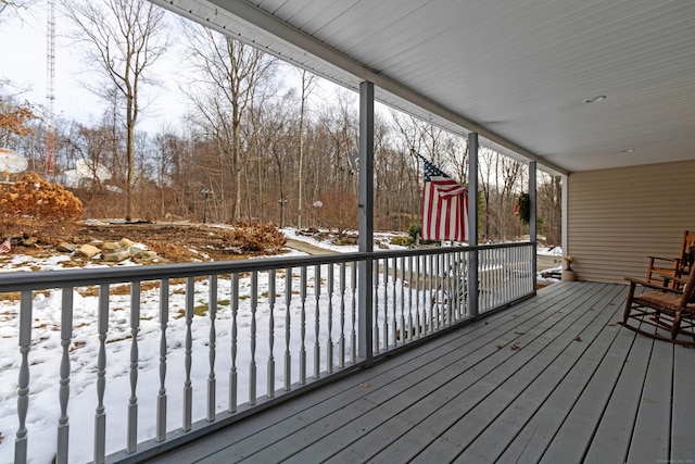 view of snow covered deck