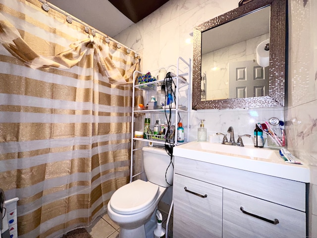 bathroom featuring decorative backsplash, toilet, tile walls, and vanity