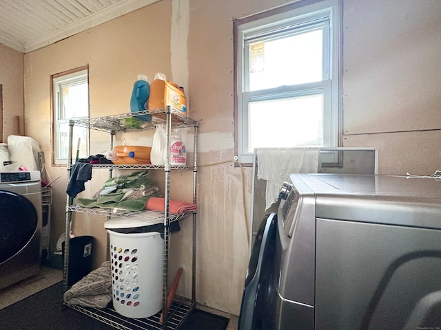 laundry area with ornamental molding