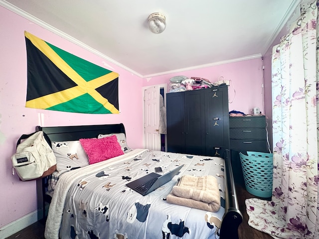 bedroom featuring ornamental molding