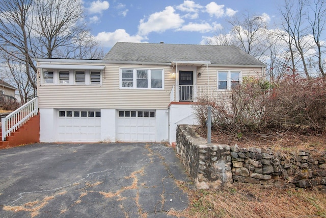 view of front of property featuring a garage