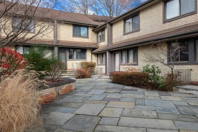 property entrance with a patio area